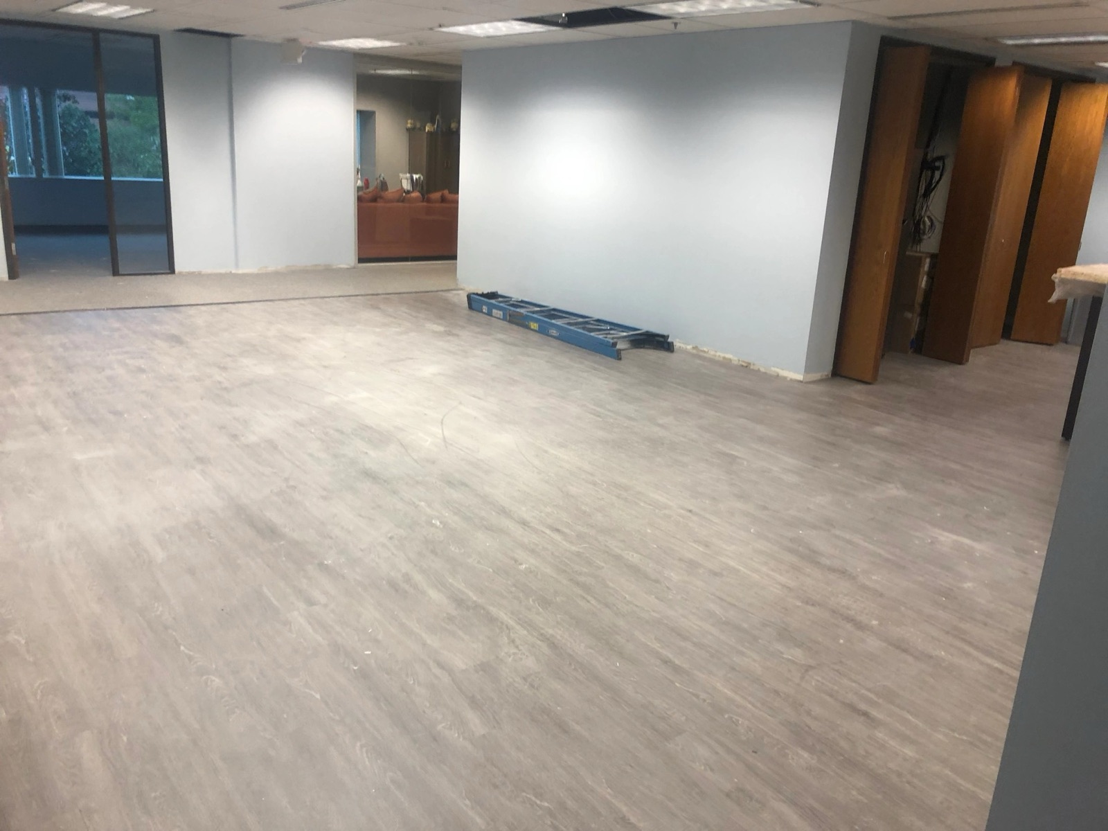 A renovated interior tenant space with new flooring and finishes